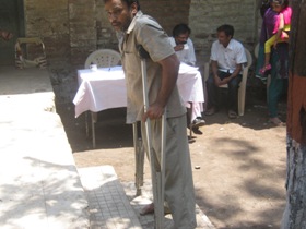Disabledpersonwithcrutches